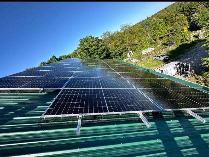 Solar array on a green metal roof